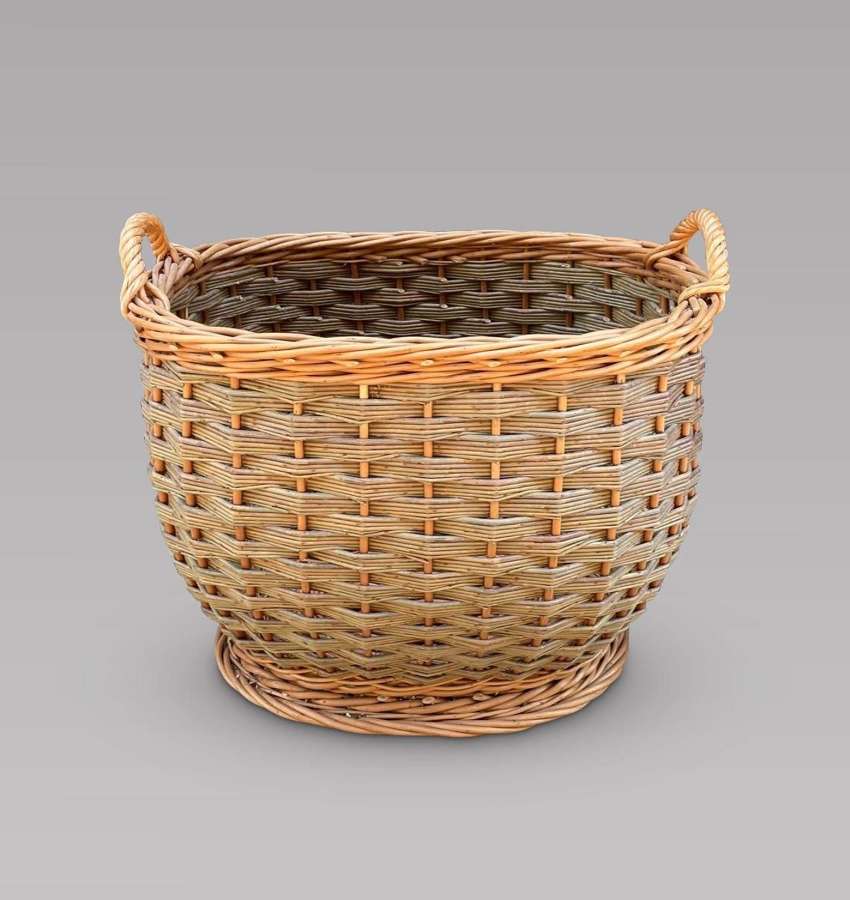 A Good Sized Oval Wicker Basket with Handles