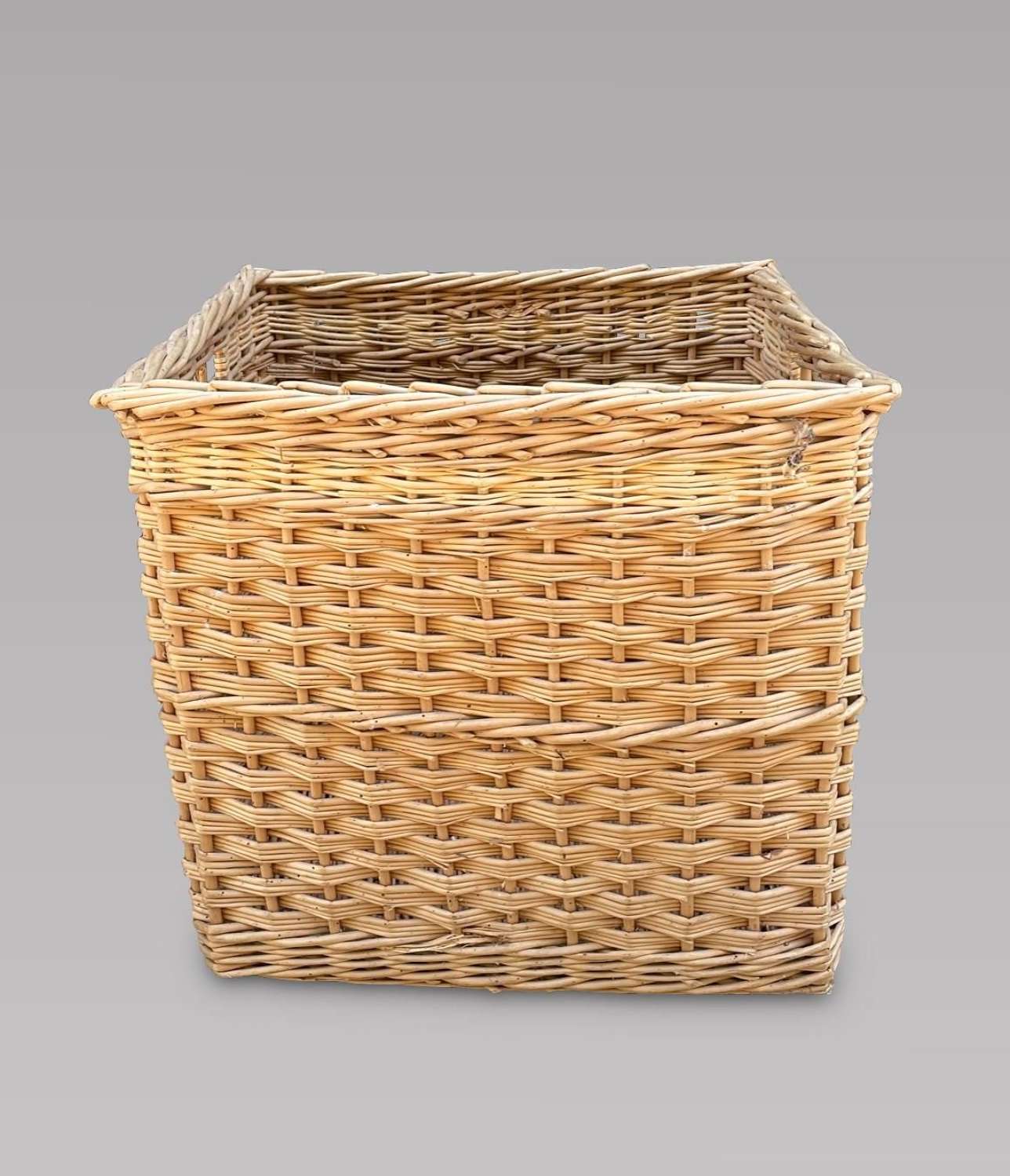 A Medium Sized Wicker Log Basket