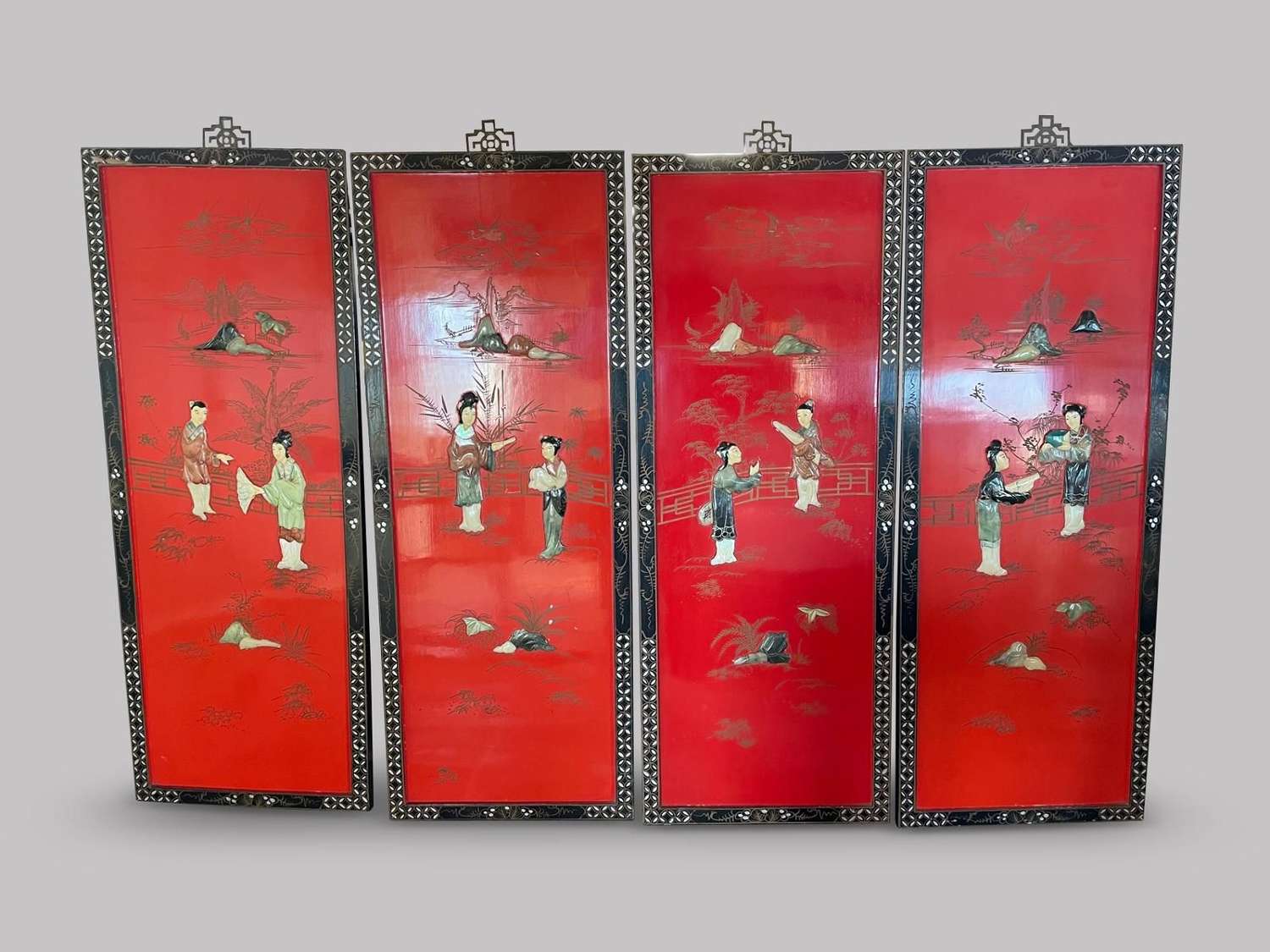 Set of Four Chinese Red Lacquered Panels
