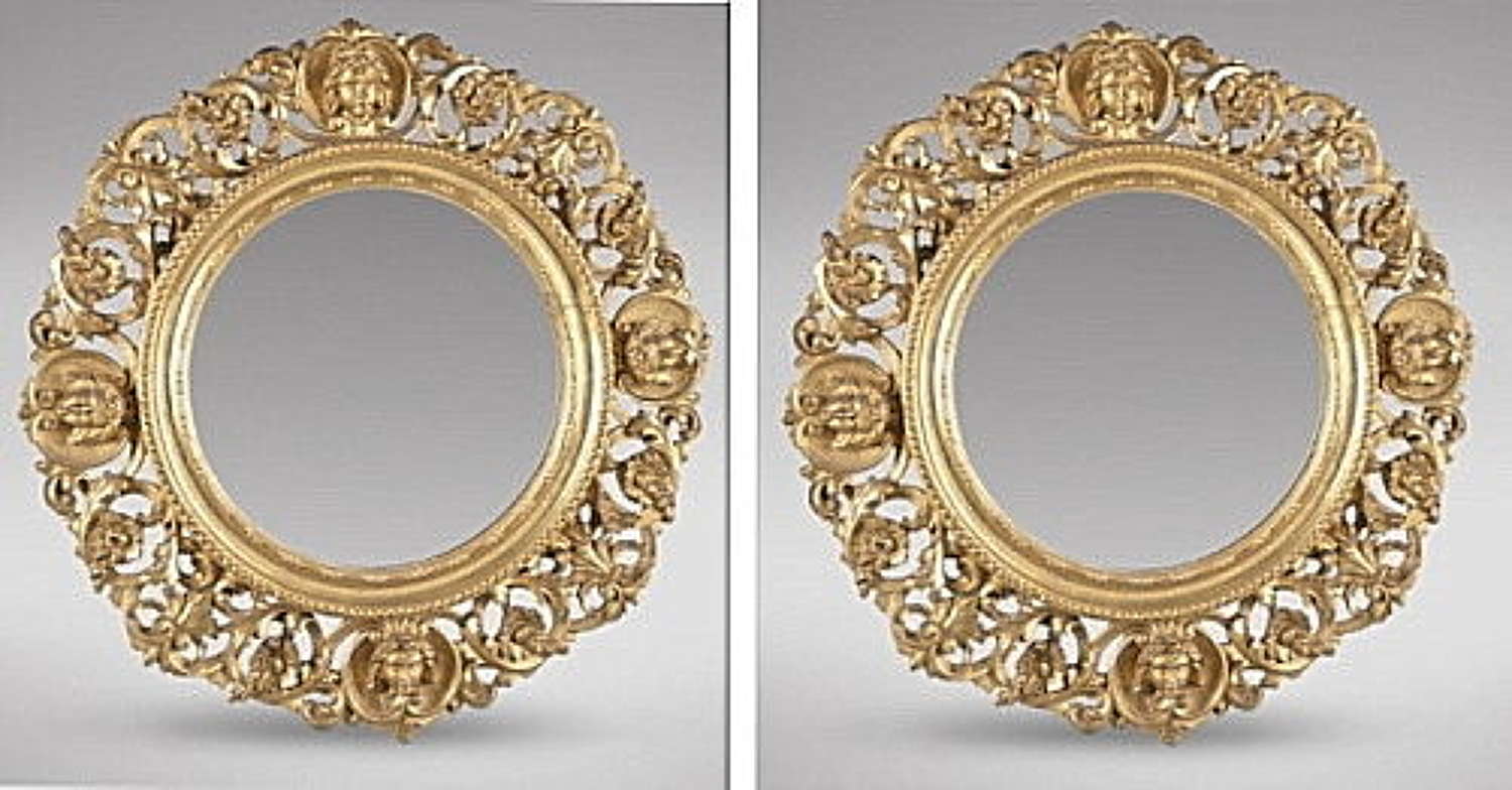 Pair of Italian Carved Giltwood Circular Mirrors