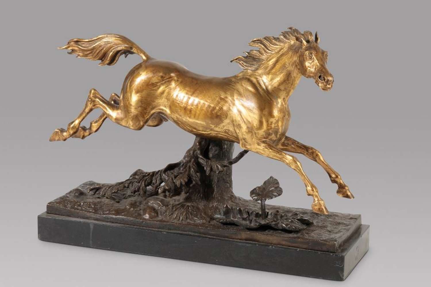 A Lovely Gilt Bronze Model Of a Horse