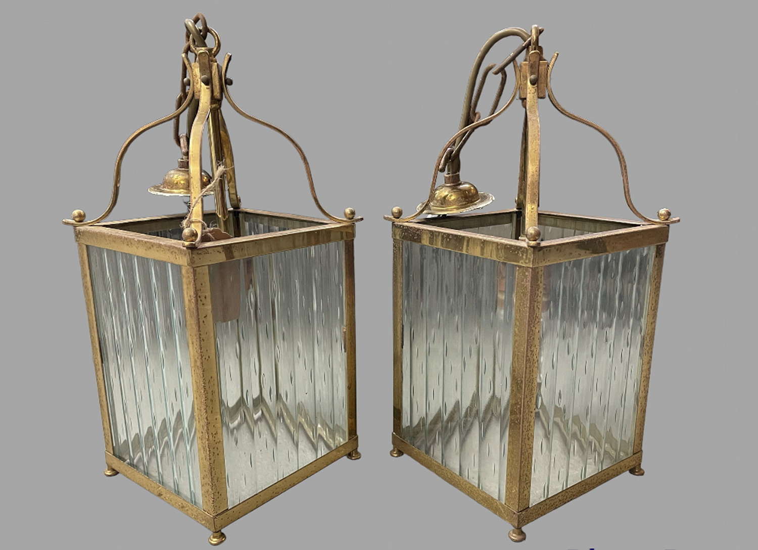 A Pair Of Brass Ceiling Lanterns