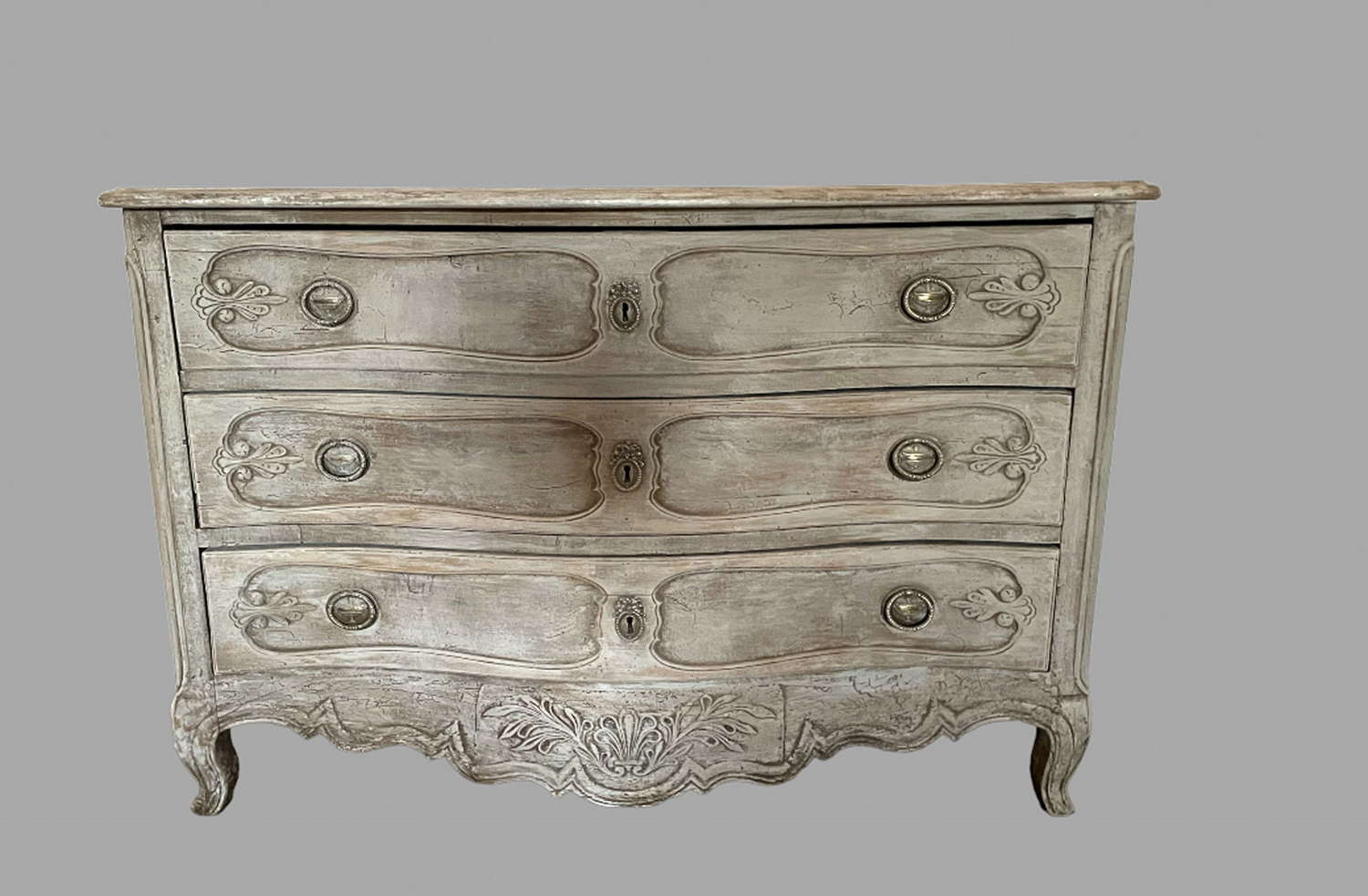 A Serpentine Commode Chest of Drawers