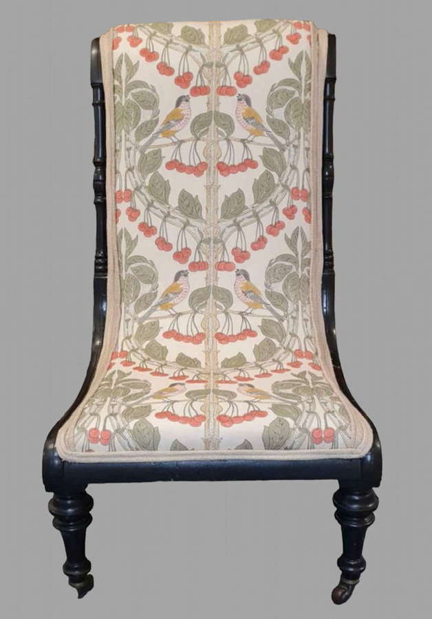 An Attractive Ebonised Victorian Chair