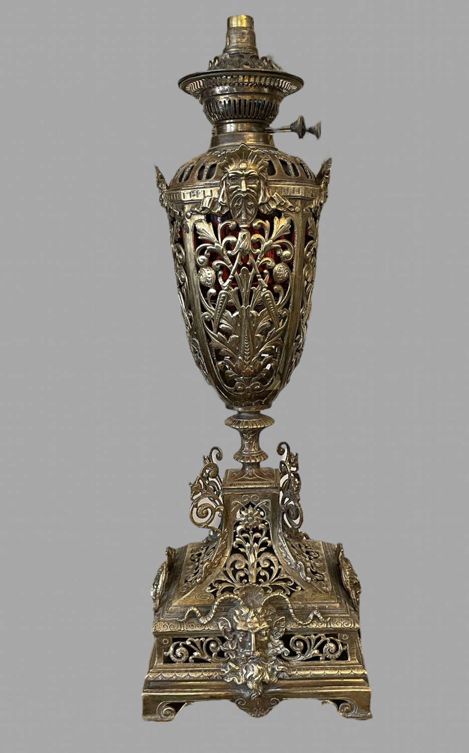 An Ornate Brass and Ormolu Oil Lamp