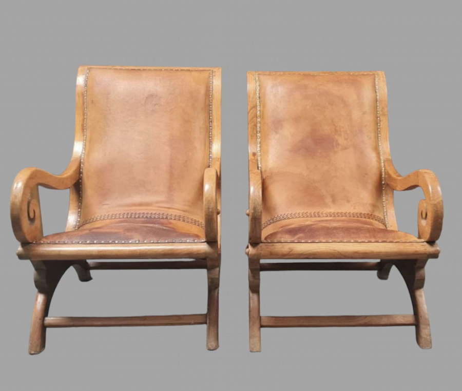 A Pair of c1930 Tan Fruitwood Plantation Leathered Armchairs