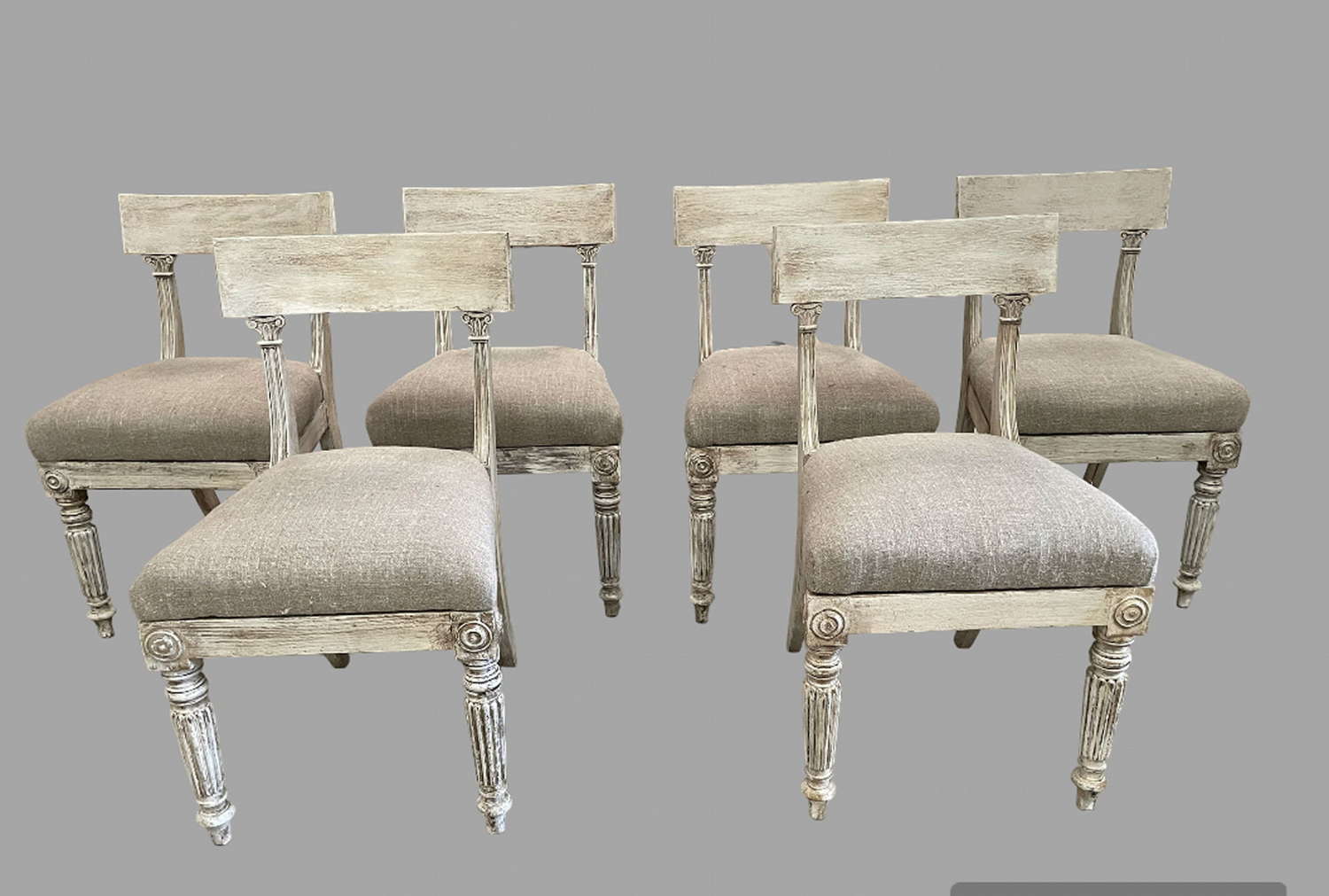 A Set of Six Bar Back Dining Chairs