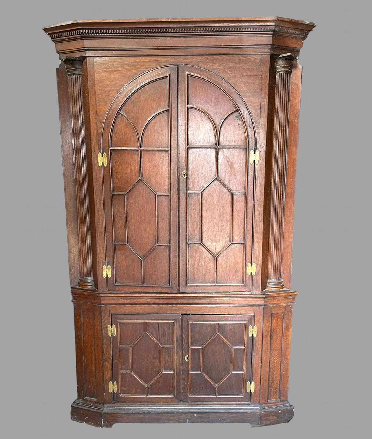 A Large Georgian Oak Corner Cupboard