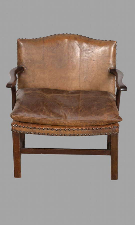 A Cromwellian Style Brown Leather Childs Armchair