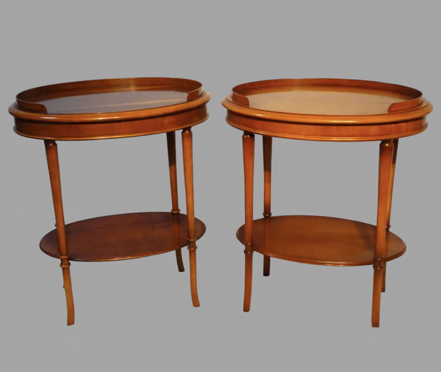 A Pair of Oval Lamp/Bedside Tables