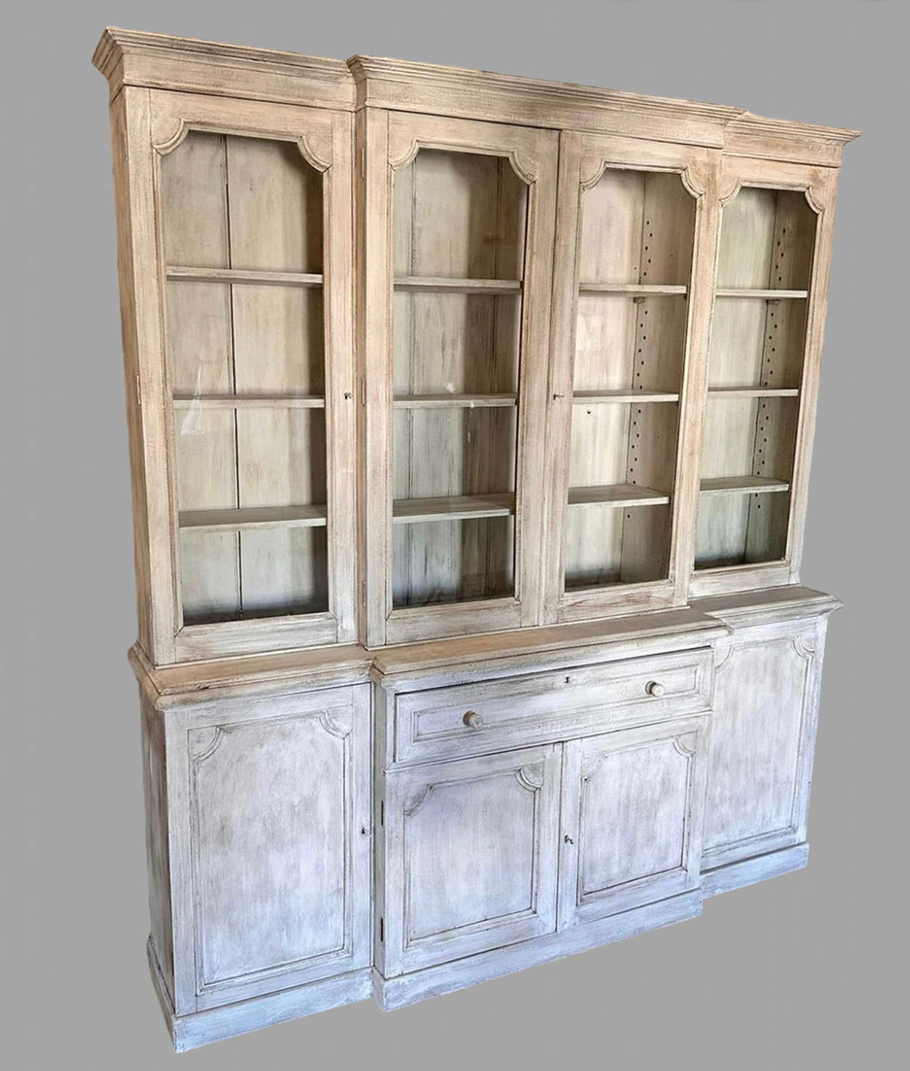 A 19th Century English Painted Breakfront Bookcase