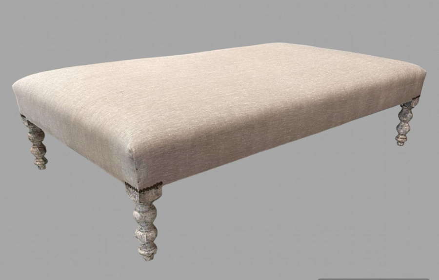 A large Upholstered Stool