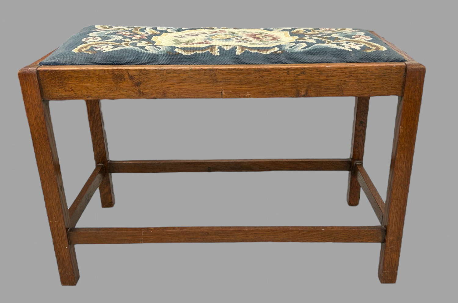 A Tapestry Upholstered Piano Stool