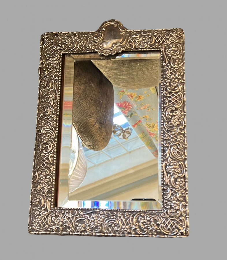 An Oblong Shaped Silver Mirror 1900.