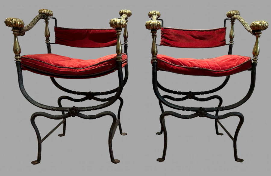 A Pair Of Wrought Iron And Brass Savonarola Chairs