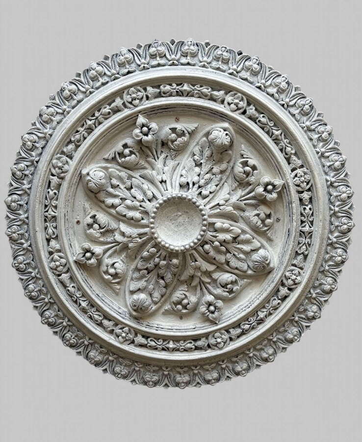 An Ornate Ceiling Medallion or Decorative Rosette