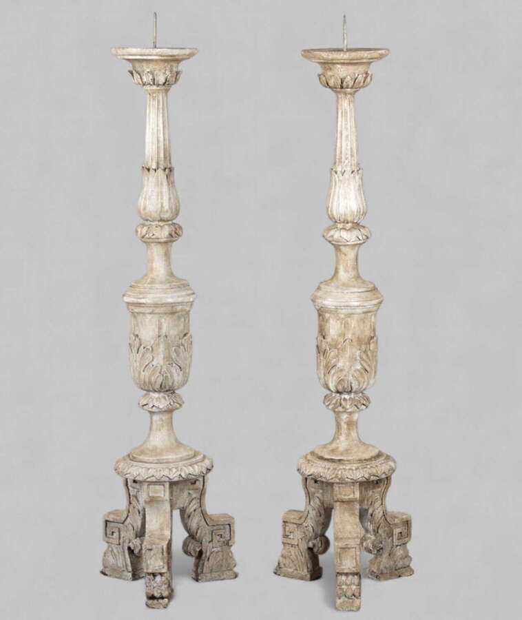 A Highly Decorative Pair of French Wooden Candle Holders