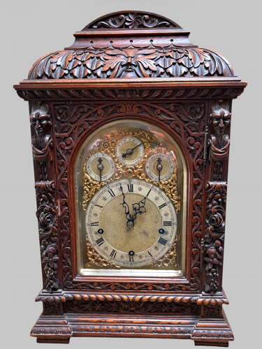 A Wonderfully Carved Bracket Clock by Winterhalder & Hofmeier of Germany