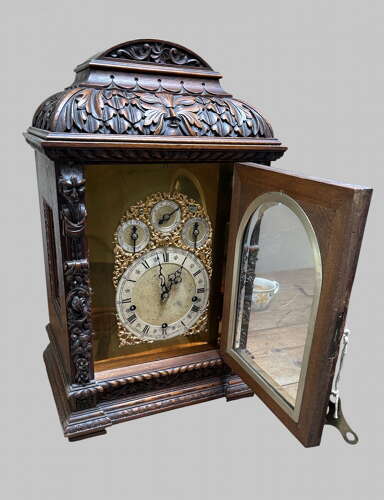 A Wonderfully Carved Bracket Clock by Winterhalder & Hofmeier of Germany